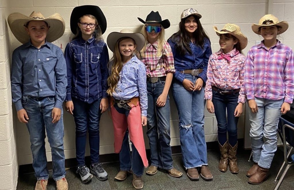 students in cowboy and cow girl outfits