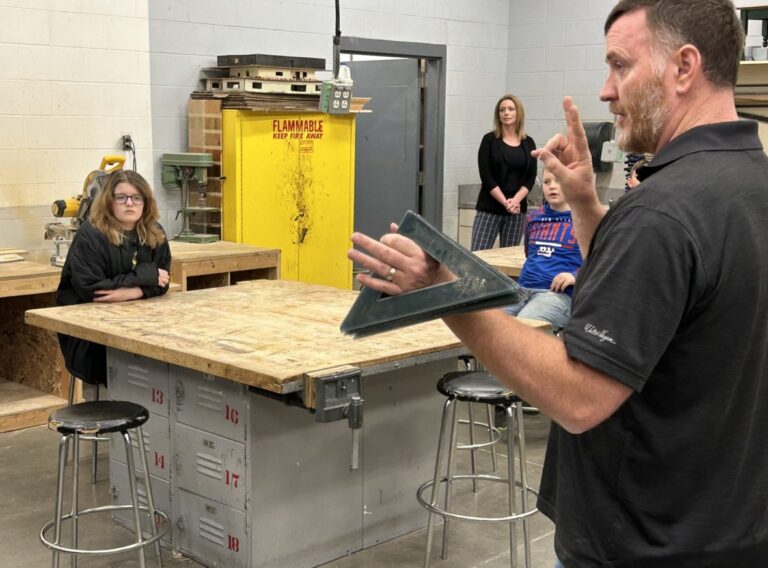 Shop teacher Roman Scott uses close reading strategies in his class. Gooding used targeted strategies to raise its ELA proficiency scores by nearly 26%.